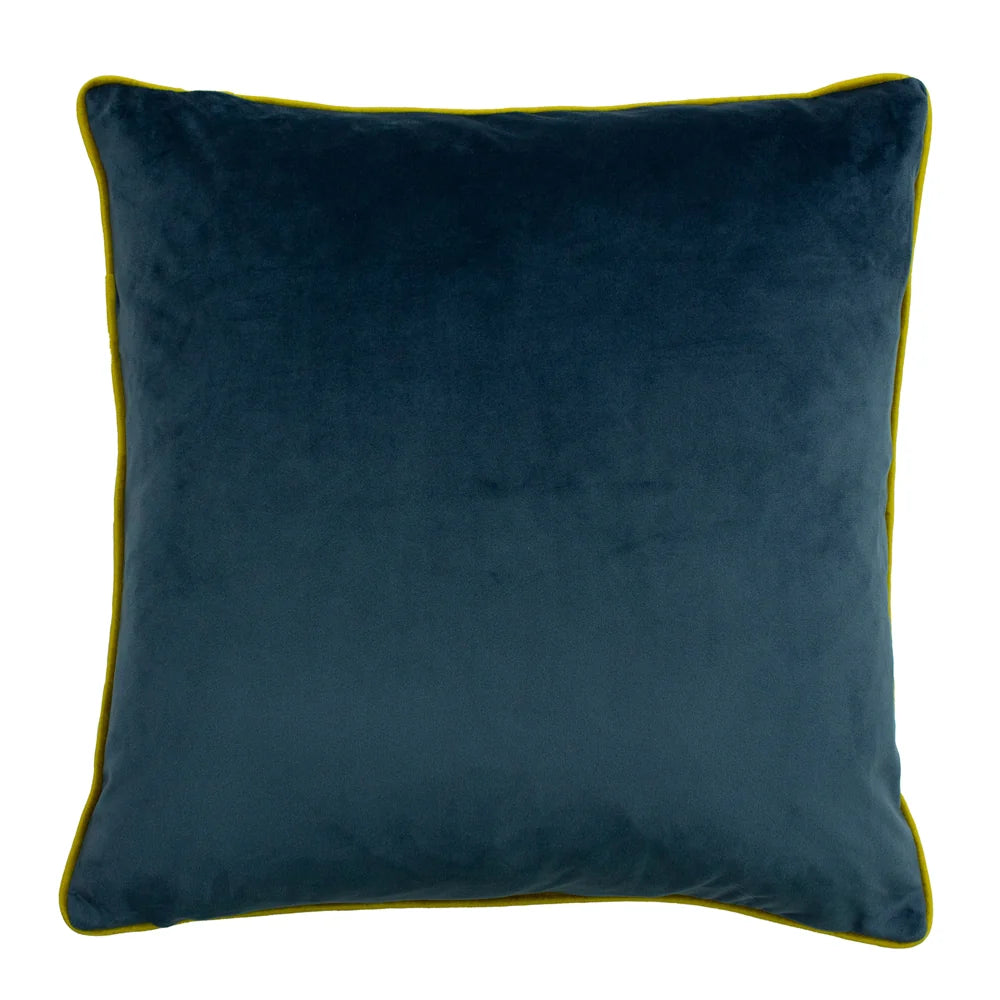 Plain petrol blue velvet reverse side of the cushion edged with mustard piping – Kumperi