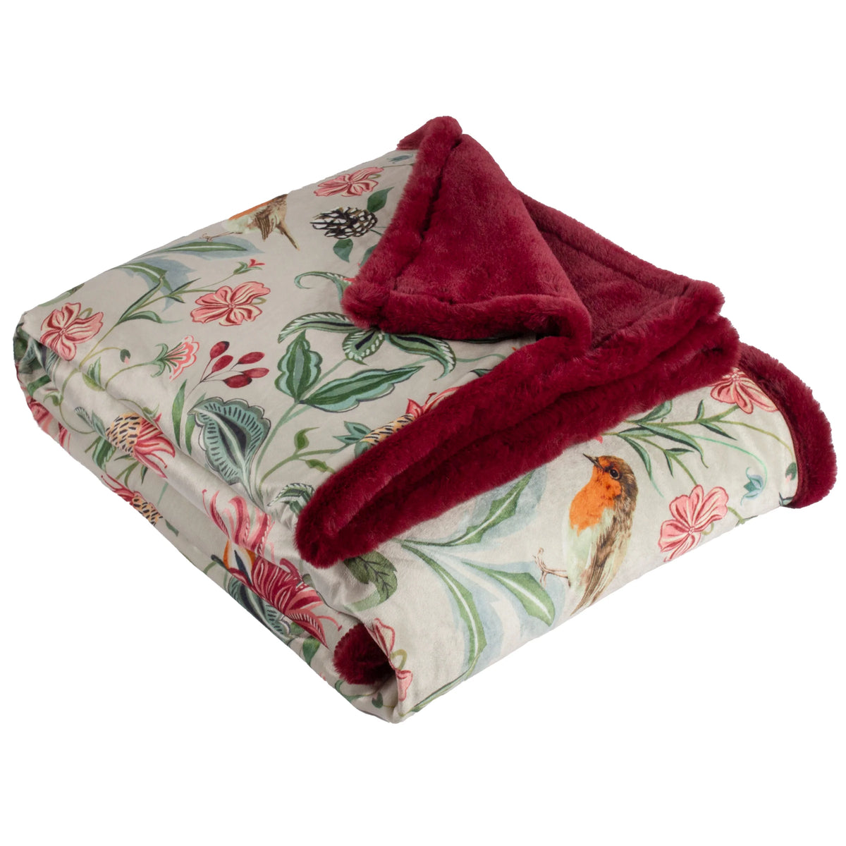 Folded velvet throw showing the cream floral print face with pink honeysuckle blooms, green foliage, pinecones and a robin, with the corner turned back to reveal the deep burgundy faux fur reverse – Kumperi