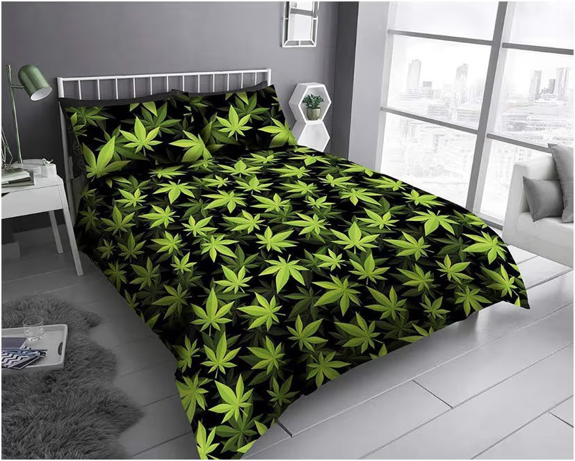 Black king duvet cover set with all-over vibrant green botanical leaf print styled on a king bed, bold graphic bedroom