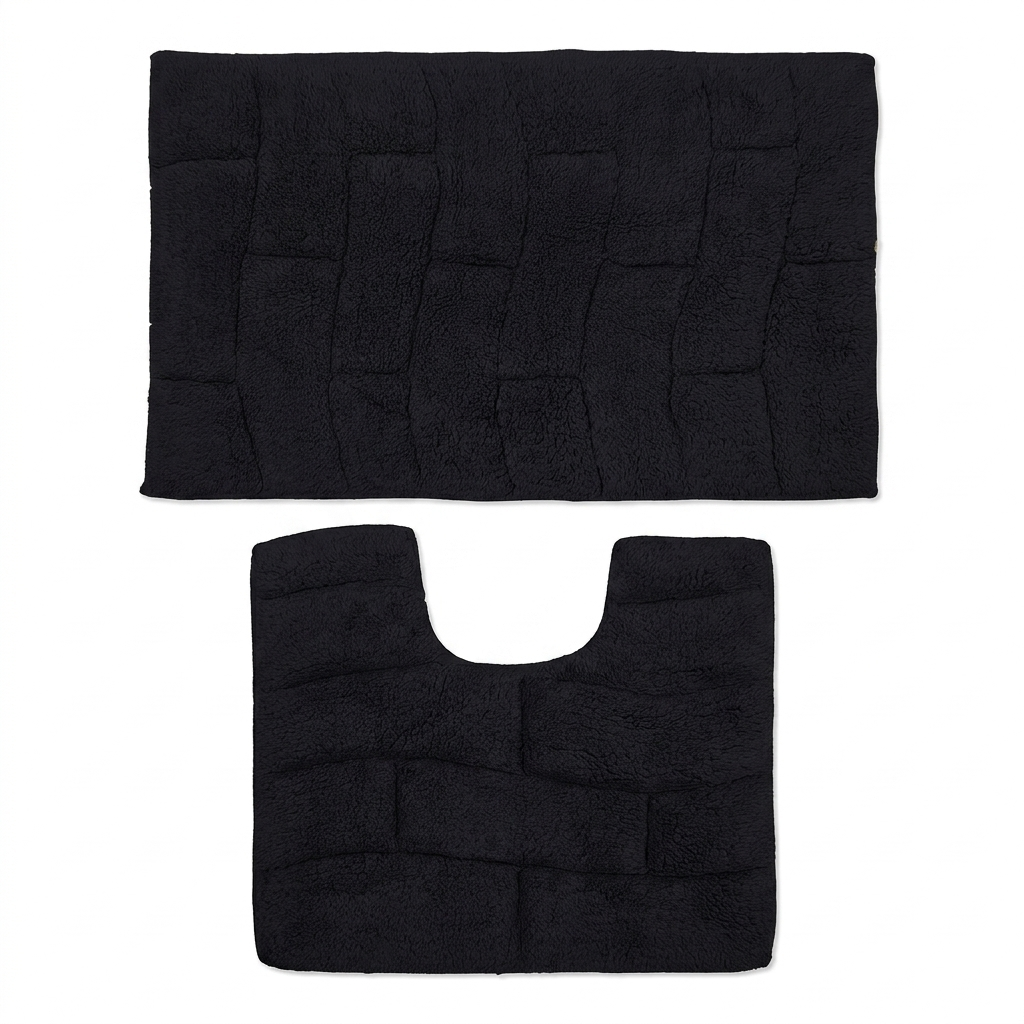 Black 100% cotton wave block texture bath mat and pedestal mat overhead flat lay on white background showing both pieces separately with raised block pile texture clearly visible bath mat 50x80cm pedestal mat 50x50cm with toilet cut-out Emma Barclay Waves design