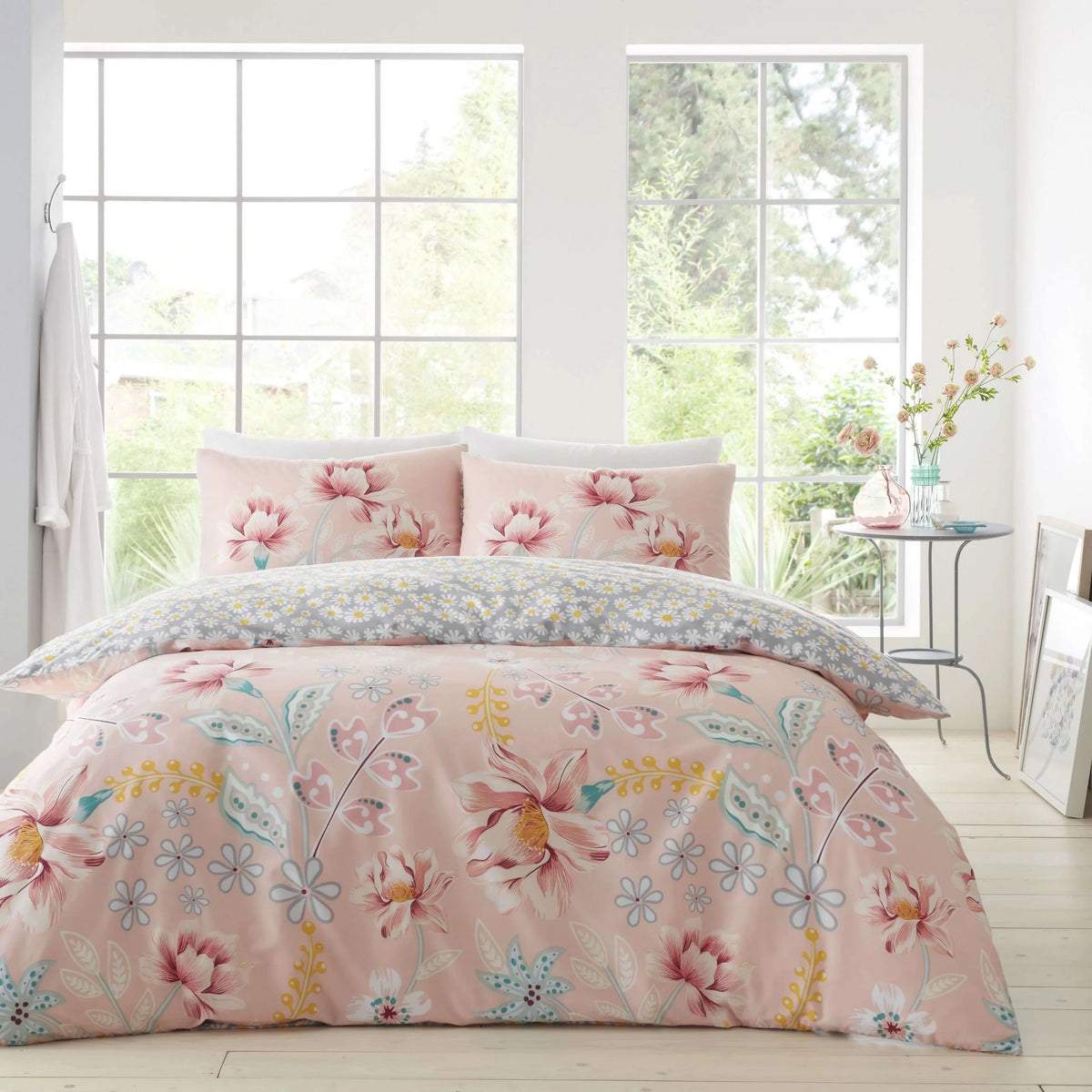Blush pink paisley floral king duvet set styled on bed