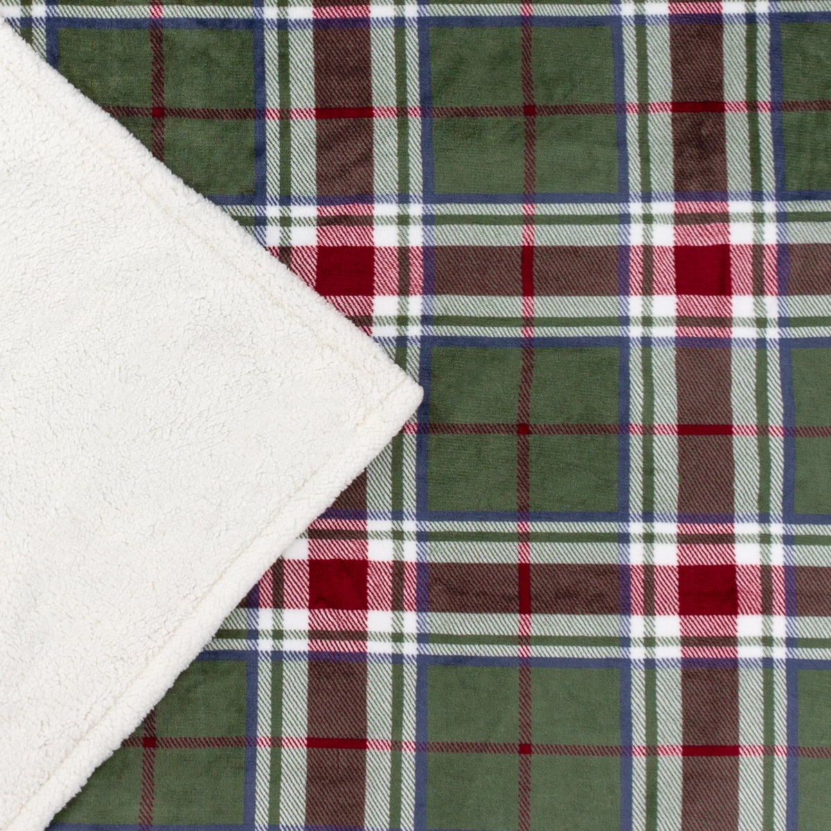 Corner of the throw folded back to show the pine green and berry red tartan check print face alongside the plain white sherpa fleece reverse – Kumperi