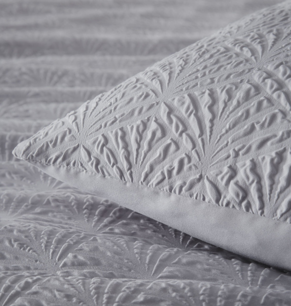 Close-up of grey embossed geometric texture on soft-touch Pillowcase
