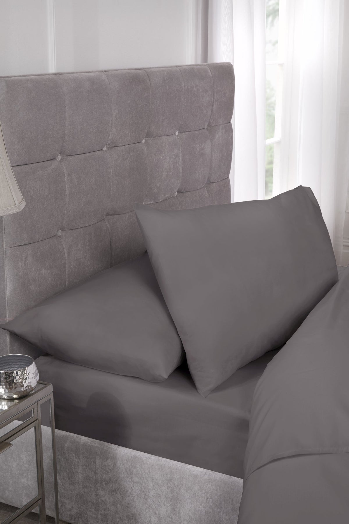 Close-up of smooth grey 180 thread count percale fabric texture, easy iron finish