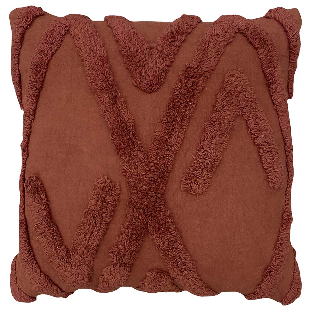 Square terracotta red cotton cushion with a raised tufted geometric pattern of interlocking chevron and diamond lines across the front – Kumperi