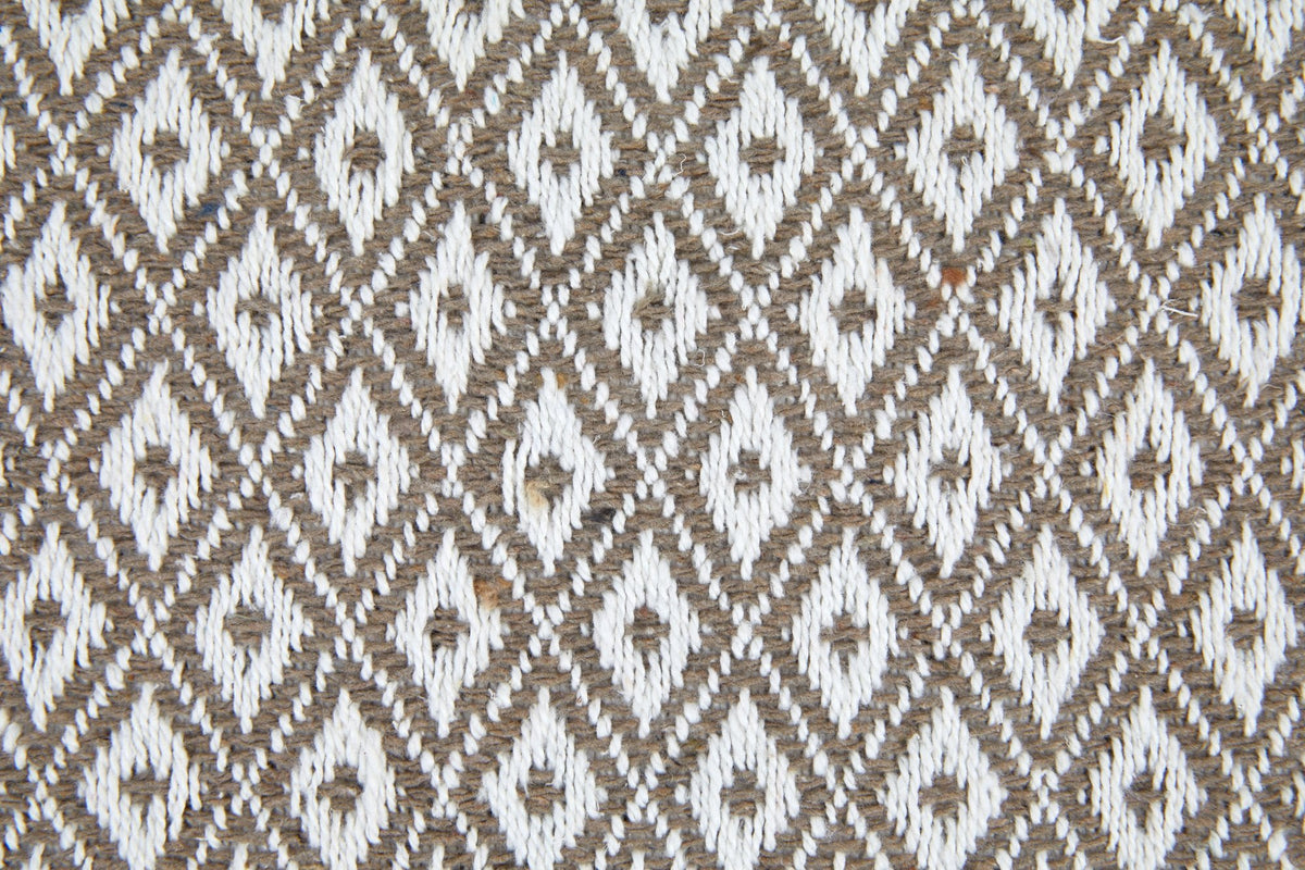 Close-up of taupe and white diamond weave fabric texture, Kumperi