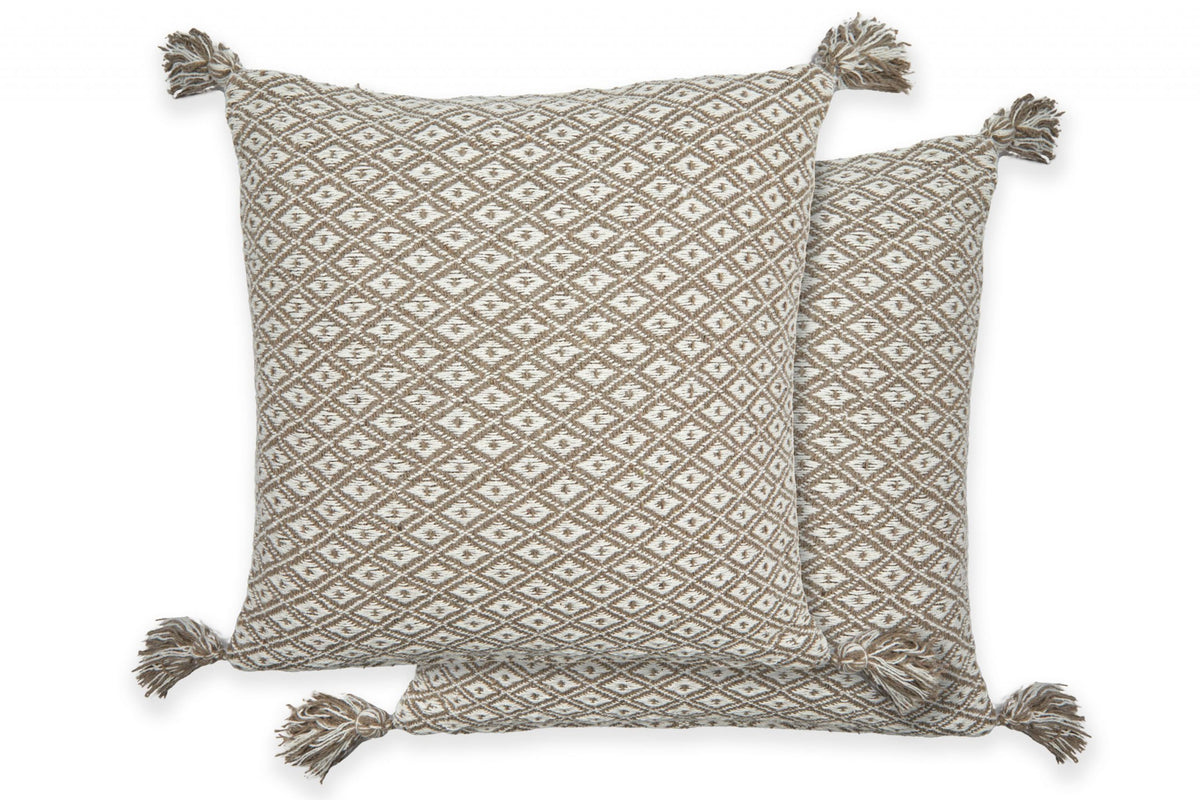 Two taupe and white diamond weave cushion covers with tassels on white background, Kumperi