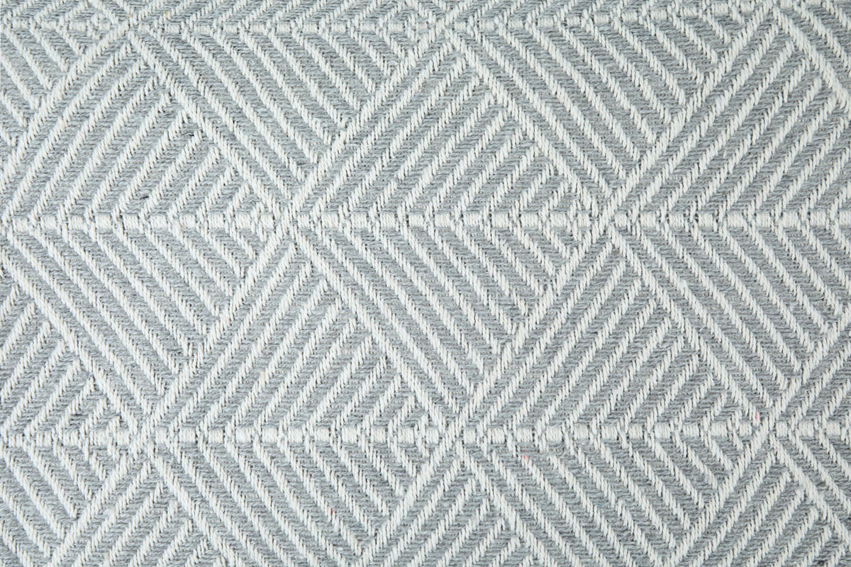 Close-up macro shot of silver herringbone weave fabric texture, Kumperi