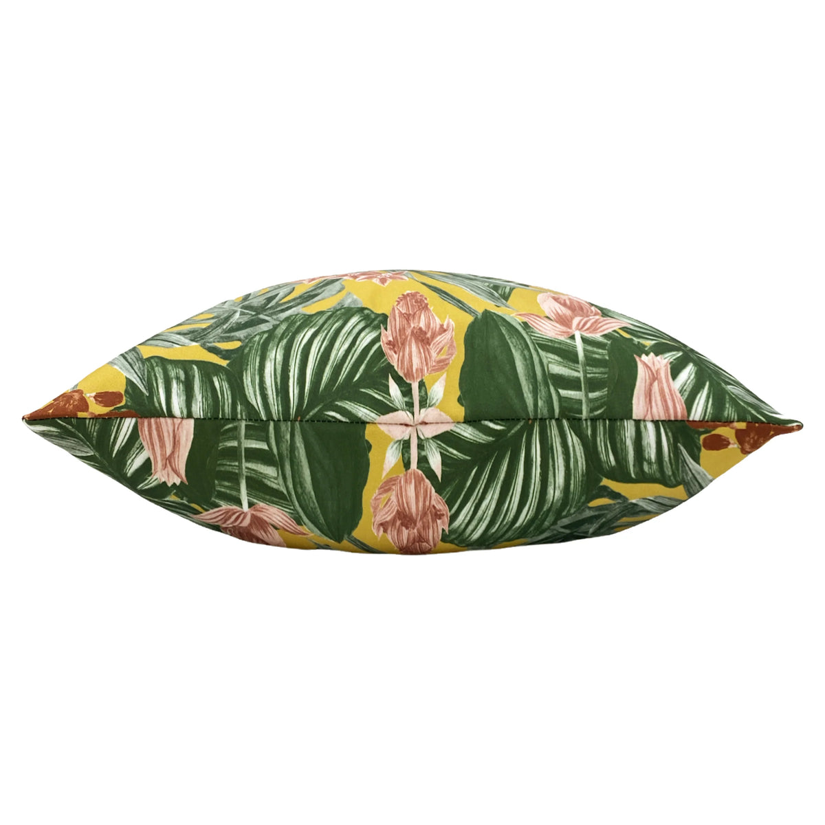 Top-down profile view of the plump cushion showing the tropical leaf and snake print wrapping around the piped edge on a mustard yellow ground – Kumperi