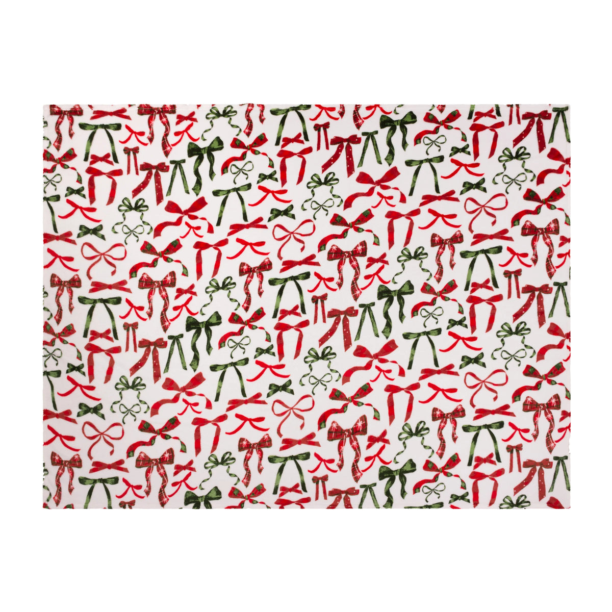 Flat top-down view of the throw showing the full repeat pattern of red velvet-style bows, red plaid bows and dark green ribbon bows on a cream ground – Kumperi