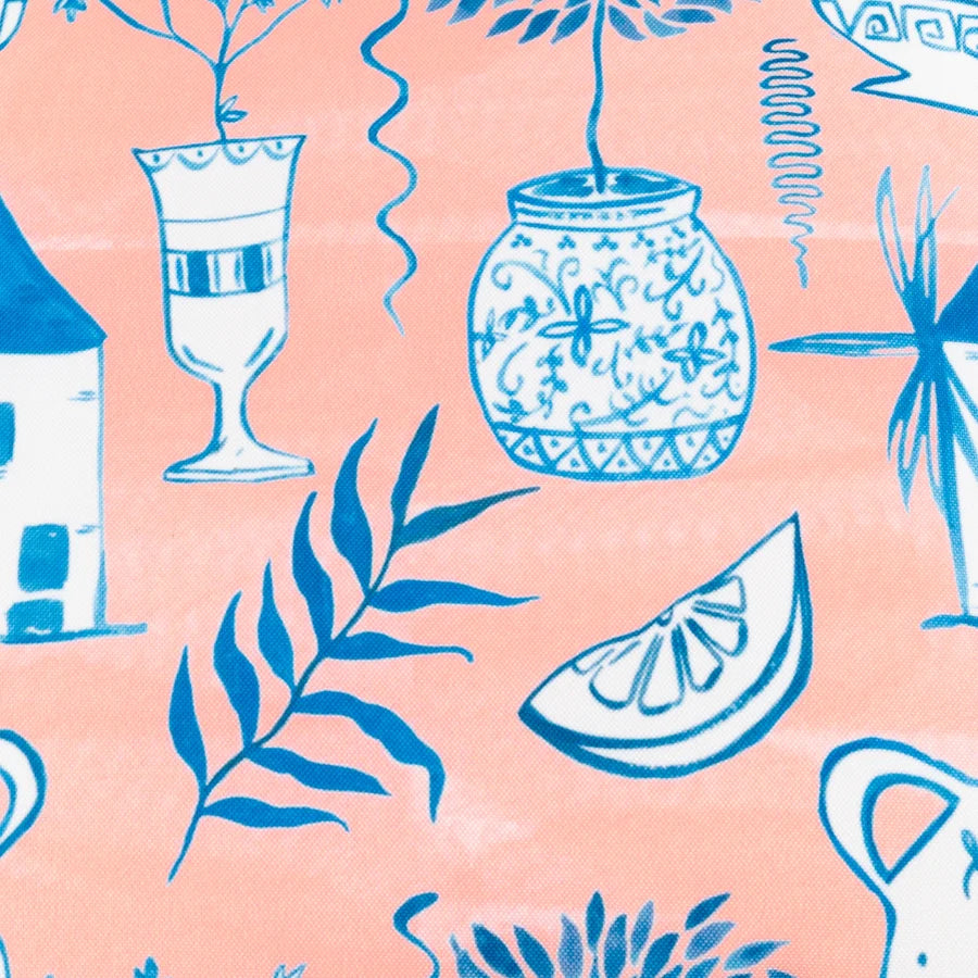 Close-up fabric detail of peach outdoor cushion art deco print, urn and citrus motif – furn.