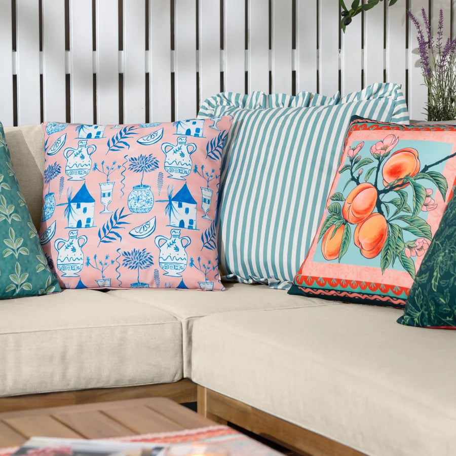Peach art deco outdoor cushion styled on garden bench with striped cushion – furn.