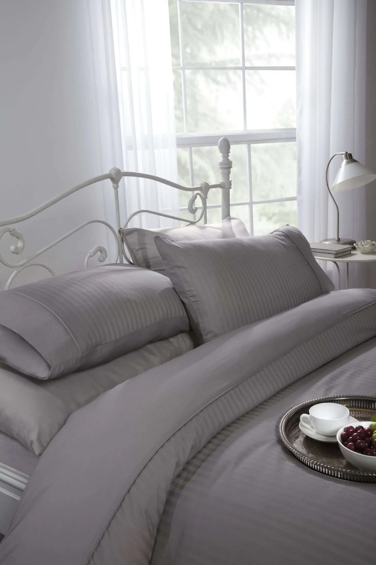 Close up of silver 300 thread count cotton sateen stripe fabric texture finely embellished finish